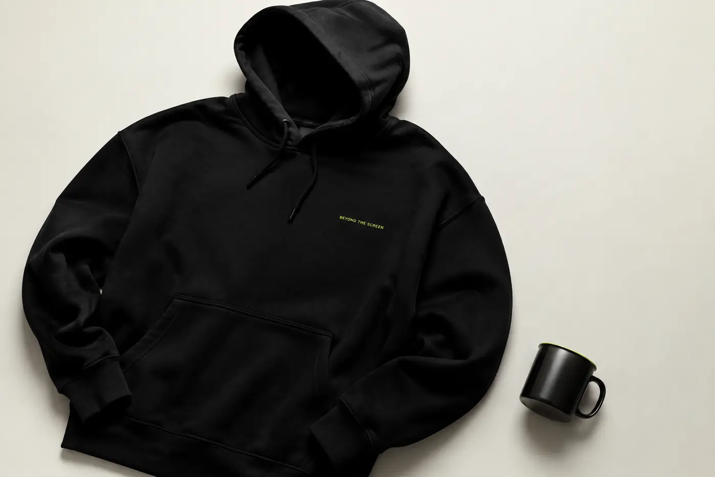 Beyond the Screen black hoodie and studio mug